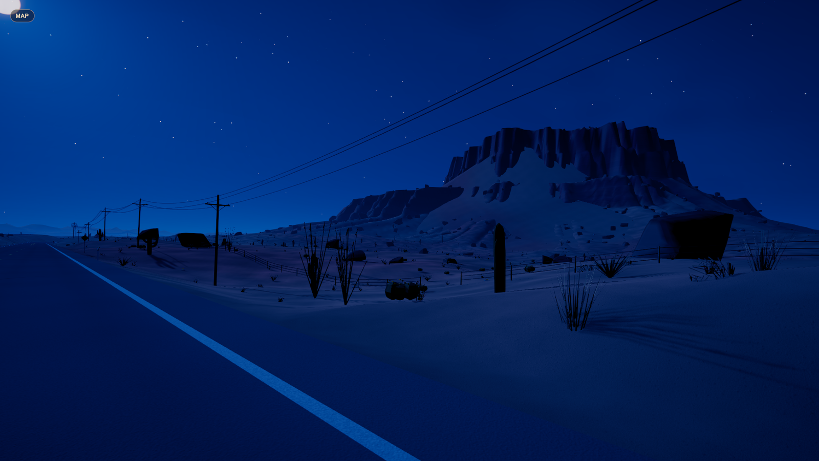 Somewhere in the middle's desert landscape under a moonlit sky